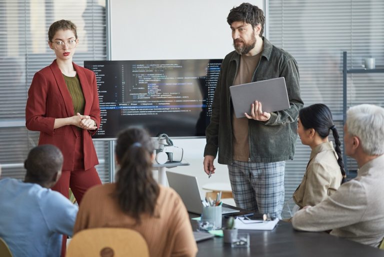 IT Team Discussing Project in Meeting