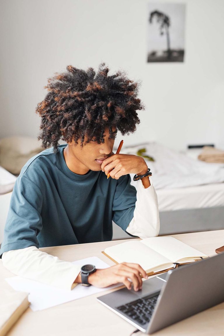 Male Student Studying at Home